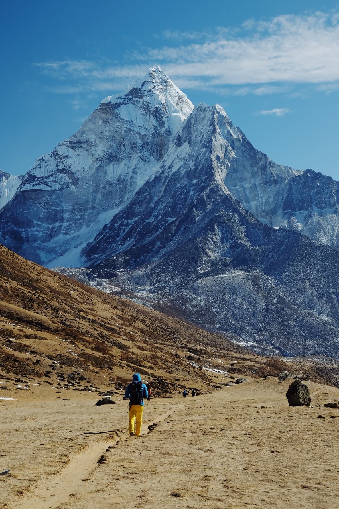 A hiker approaching a Himalayan mountain