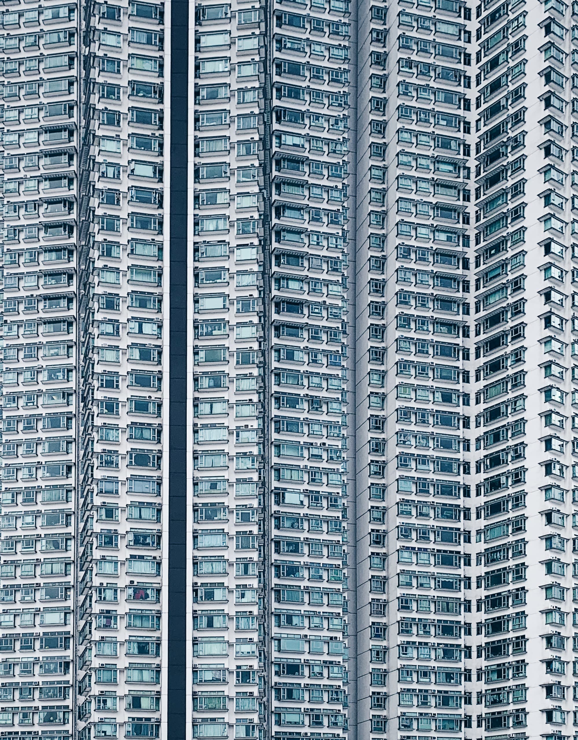 A dense grid of apartment balconies
